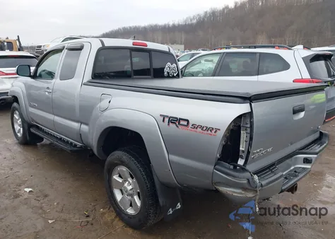 2015 Toyota Tacoma Base V6 из США, поврежденный, VIN 5TFUU4EN7FX126048